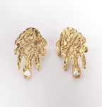 MELT BRASS EARRINGS.