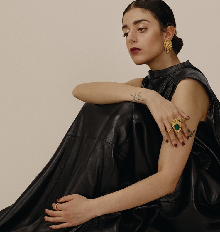 MELT BRASS EARRINGS.