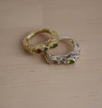 SPRINKLED KIN BRASS.