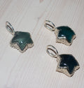 URSA CHARM SILVER FLUORITE.