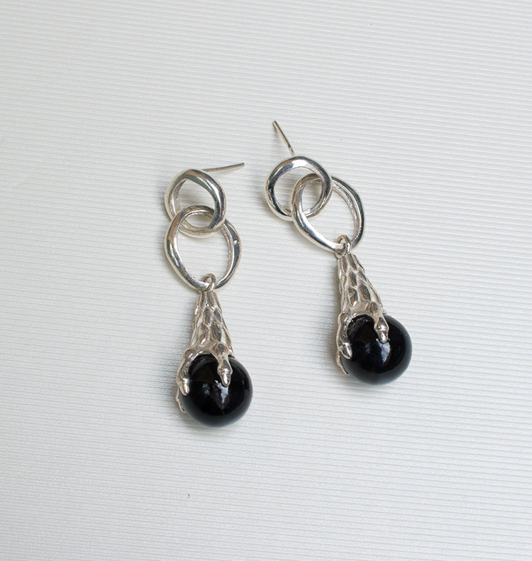 STRING ME ALONG BROWN/SILVER.